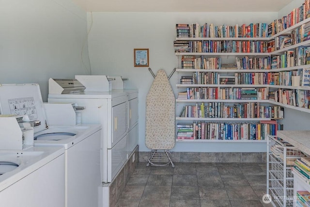 1600 5th St Unit D-162, Anacortes, WA 98221 - shared laundry room featuring washer and clothes dryer and stone finish flooring