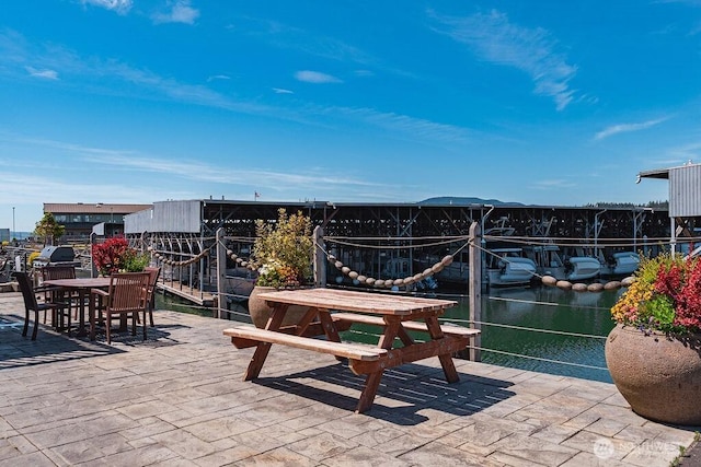1600 5th St Unit D-162, Anacortes, WA 98221 - view of patio / terrace featuring outdoor dining space and a water view