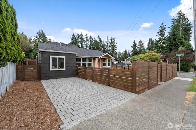 12302 5th Ave NE, Seattle, WA 98125 - rear view of house featuring a shingled roof