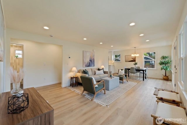 12302 5th Ave NE, Seattle, WA 98125 - living room featuring light wood-style floors, recessed lighting, and a chandelier