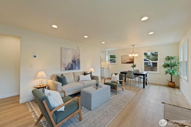 12302 5th Ave NE, Seattle, WA 98125 - living room featuring a chandelier, light wood finished floors, and recessed lighting