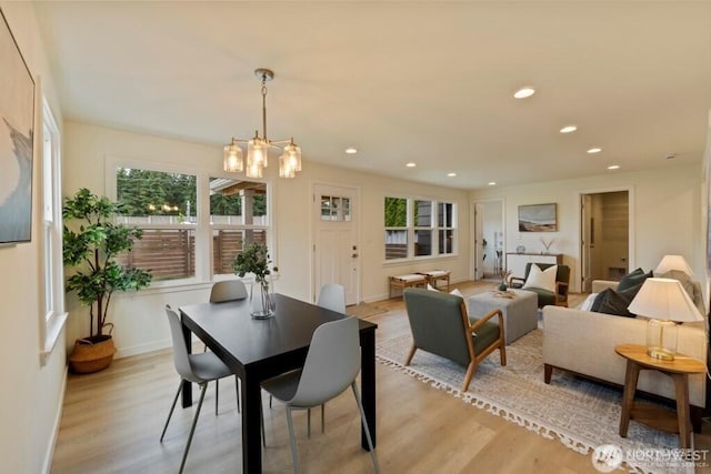 12302 5th Ave NE, Seattle, WA 98125 - dining area featuring light wood finished floors, recessed lighting, and a chandelier