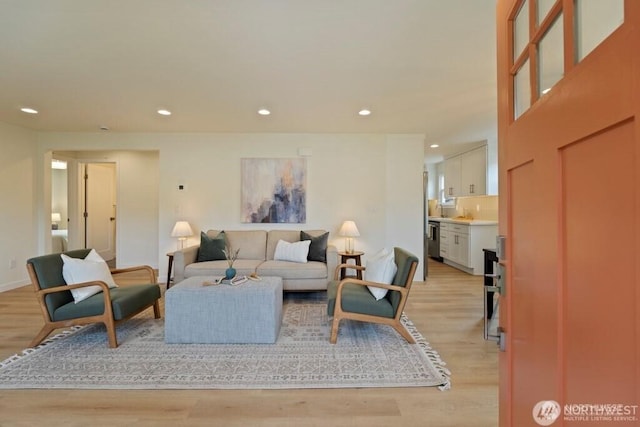 12302 5th Ave NE, Seattle, WA 98125 - living area with light wood-type flooring and recessed lighting