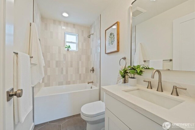 12302 5th Ave NE, Seattle, WA 98125 - full bathroom with vanity, tile patterned floors, and shower / tub combination