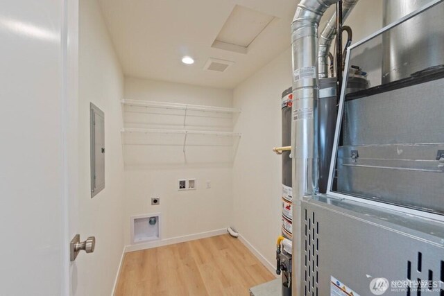 12302 5th Ave NE, Seattle, WA 98125 - laundry room featuring washer hookup, light wood-type flooring, electric panel, attic access, and hookup for an electric dryer