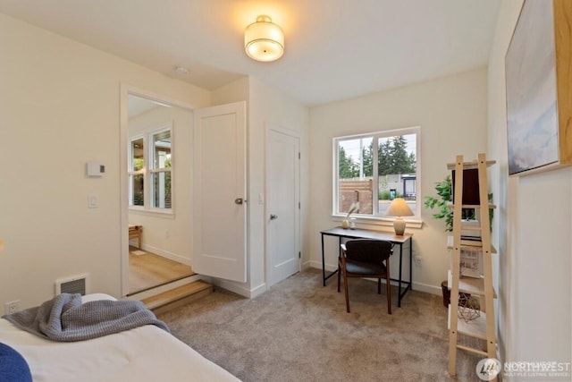 12302 5th Ave NE, Seattle, WA 98125 - carpeted bedroom with baseboards and a desk