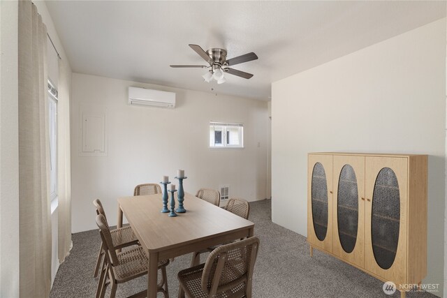812 Duffy St, Aberdeen, WA 98520 - carpeted dining area with a wall unit AC and ceiling fan