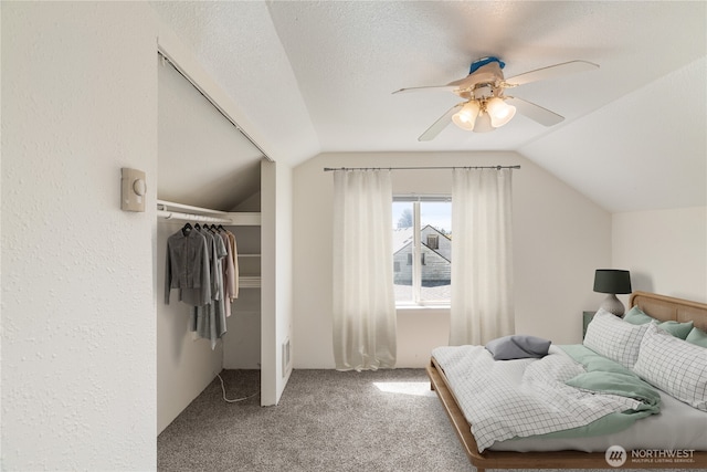 812 Duffy St, Aberdeen, WA 98520 - bedroom with vaulted ceiling, carpet, ceiling fan, and a closet