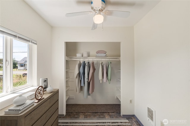 812 Duffy St, Aberdeen, WA 98520 - bedroom with multiple windows, a closet, a ceiling fan, and dark wood finished floors