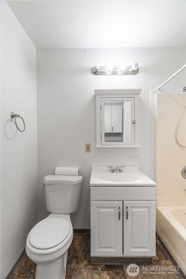 812 Duffy St, Aberdeen, WA 98520 - full bathroom with vanity,  shower combination, and stone finish floors