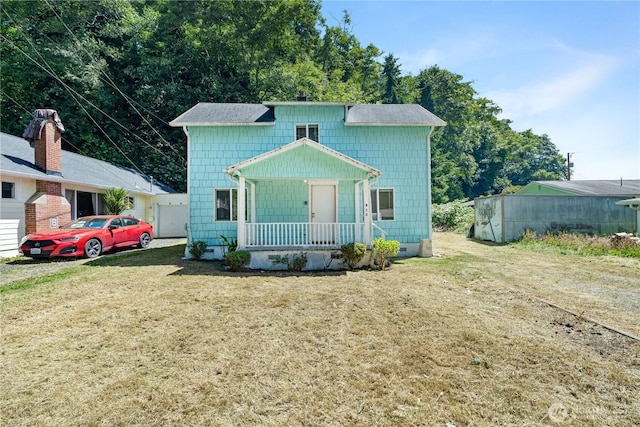 812 Duffy St, Aberdeen, WA 98520 - view of front of house with a porch, a front yard, and crawl space