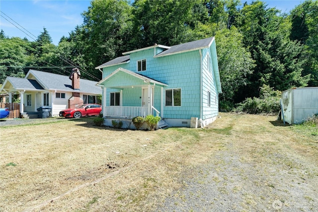 812 Duffy St, Aberdeen, WA 98520 - view of front facade featuring covered porch, crawl space, and a front yard