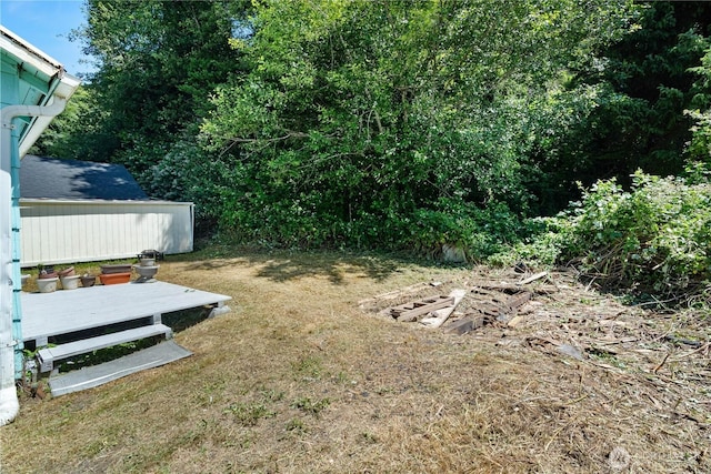 812 Duffy St, Aberdeen, WA 98520 - view of green lawn featuring a deck