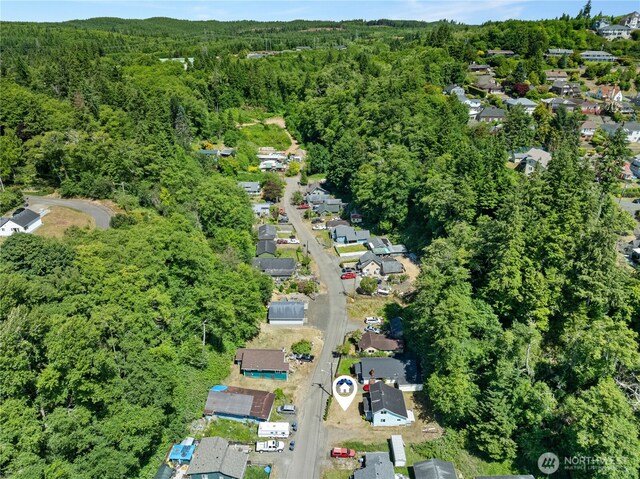 812 Duffy St, Aberdeen, WA 98520 - aerial overview of property's location featuring a heavily wooded area and nearby suburban area