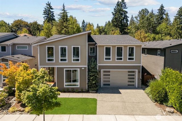 23422 26th Ave SE, Bothell, WA 98021 - view of front facade featuring driveway, a garage, and a shingled roof
