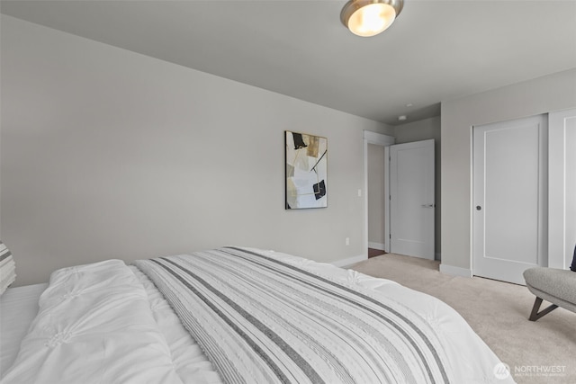 23422 26th Ave SE, Bothell, WA 98021 - bedroom featuring light carpet and a closet