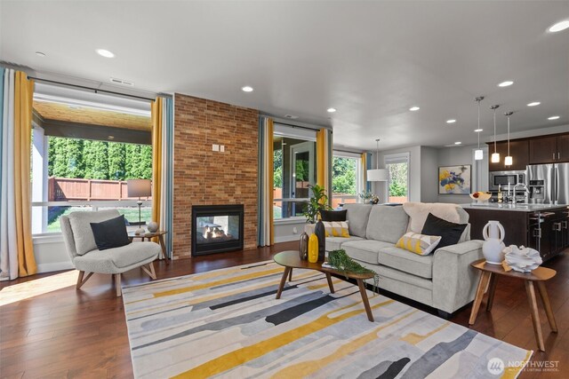 23422 26th Ave SE, Bothell, WA 98021 - living area featuring wood finished floors, recessed lighting, and a fireplace