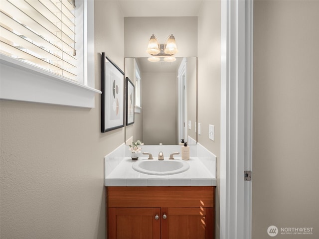 3011 Humes Pl W, Seattle, WA 98119 - bathroom with a chandelier and vanity