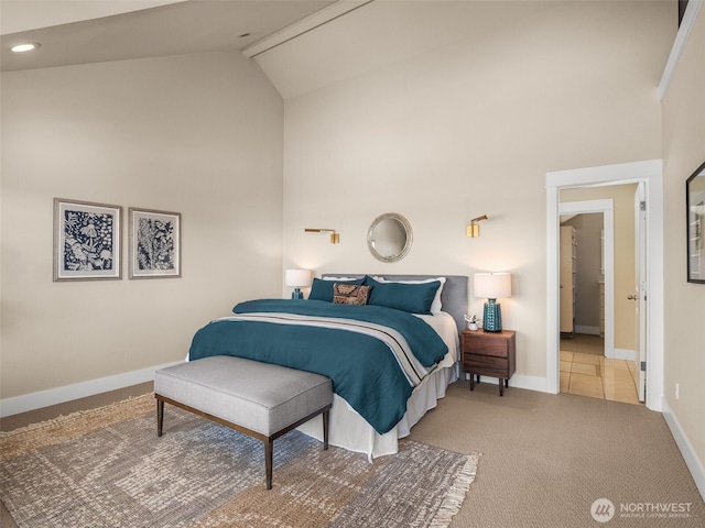 3011 Humes Pl W, Seattle, WA 98119 - carpeted bedroom with high vaulted ceiling and recessed lighting