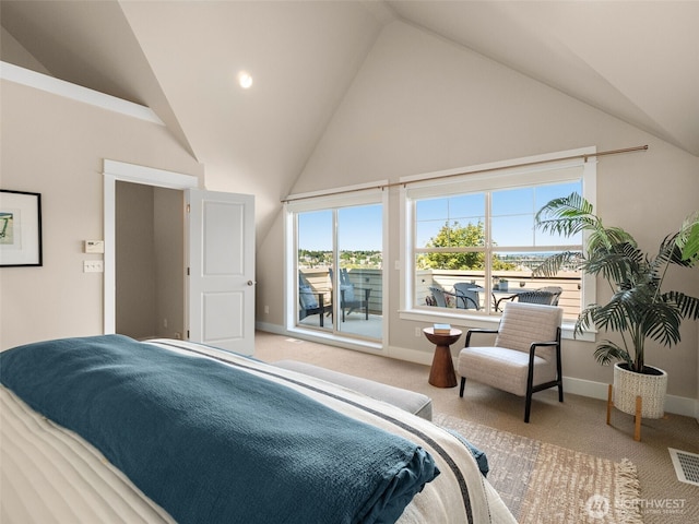 3011 Humes Pl W, Seattle, WA 98119 - bedroom featuring carpet floors, access to exterior, and high vaulted ceiling