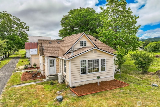 143 Mauerman Rd, Chehalis, WA 98532 - rear view of property with a shingled roof and entry steps