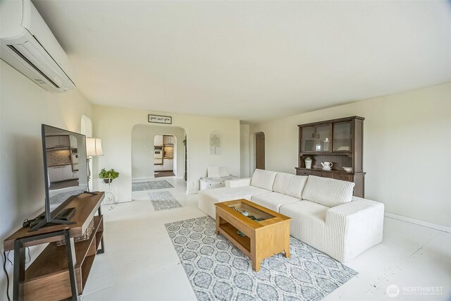 143 Mauerman Rd, Chehalis, WA 98532 - living area with arched walkways and a wall mounted AC