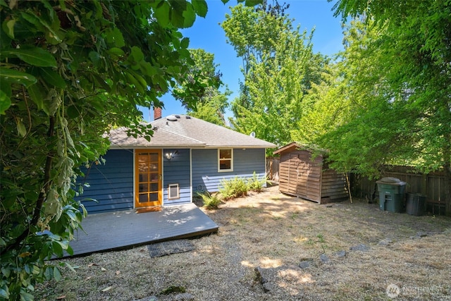 1524 30th Ave, Seattle, WA 98122 - back of property with a storage unit and a deck