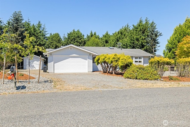 50 Steve Pl, Sequim, WA 98382 - obstructed view of property featuring a detached garage