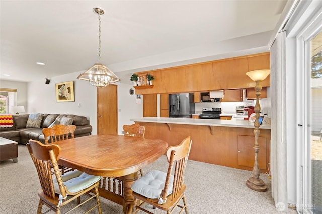 50 Steve Pl, Sequim, WA 98382 - dining room featuring light carpet and a chandelier