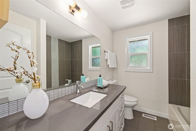 10032 35th Ave NE, Seattle, WA 98125 - bathroom featuring vanity, tile patterned floors, and shower / bath combination