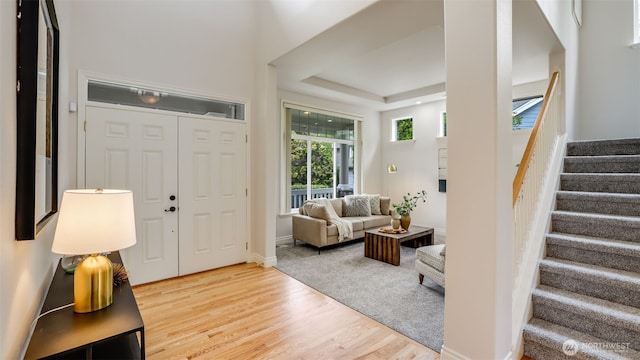 17303 SE 185th St, Renton, WA 98058 - entrance foyer featuring stairs, wood finished floors, and a tray ceiling