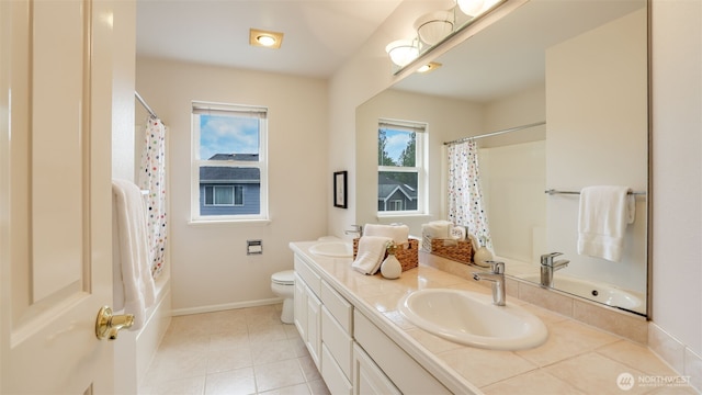 17303 SE 185th St, Renton, WA 98058 - bathroom with double vanity, tile patterned flooring, and shower / bath combo with shower curtain