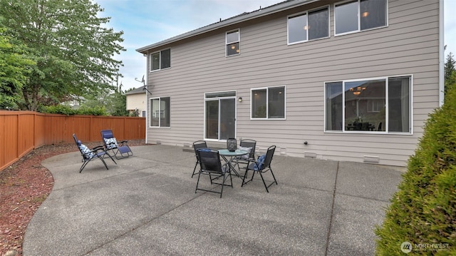 17303 SE 185th St, Renton, WA 98058 - back of property with a patio area, a fenced backyard, crawl space, and outdoor dining area