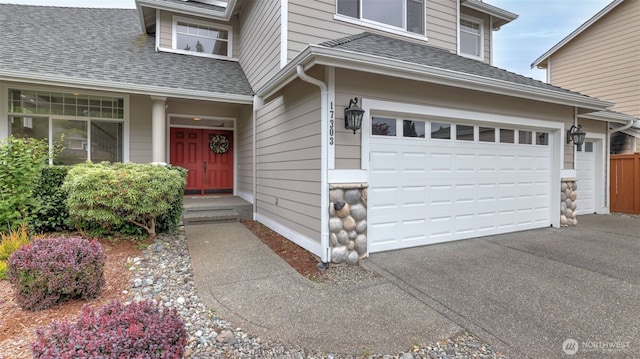 17303 SE 185th St, Renton, WA 98058 - entrance to property with a shingled roof, a garage, and asphalt driveway
