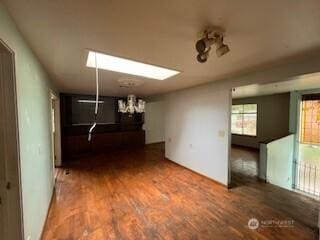 29024 38th Ave S, Auburn, WA 98001 - unfurnished dining area with a chandelier and wood finished floors