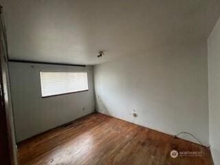 29024 38th Ave S, Auburn, WA 98001 - unfurnished room featuring wood finished floors