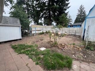 29024 38th Ave S, Auburn, WA 98001 - fenced backyard with a shed