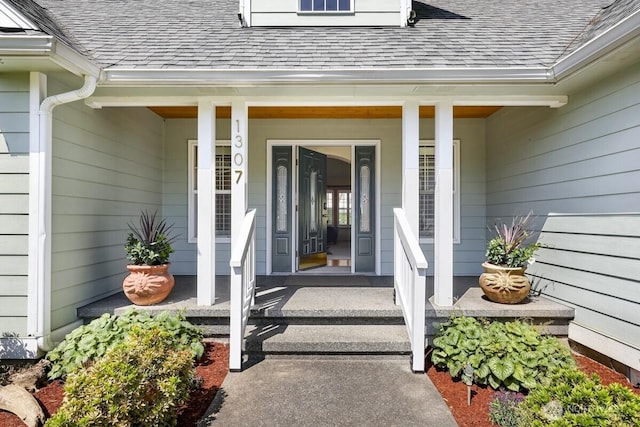 1307 Birchwood Dr, Everson, WA 98247 - view of exterior entry with roof with shingles and a porch