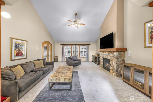 1307 Birchwood Dr, Everson, WA 98247 - living area with carpet, ceiling fan, a fireplace, and high vaulted ceiling