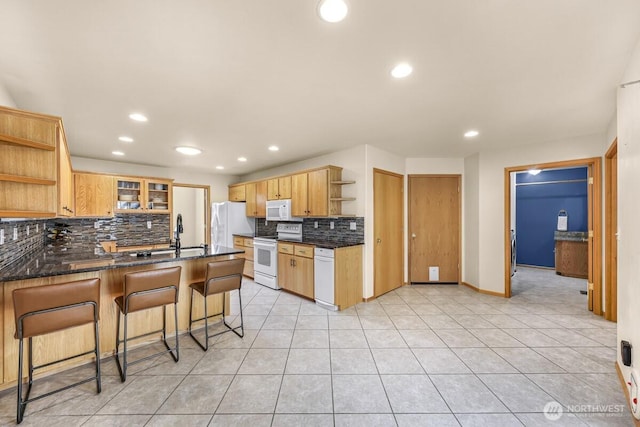 1307 Birchwood Dr, Everson, WA 98247 - kitchen featuring open shelves, white appliances, a peninsula, decorative backsplash, and light tile patterned floors