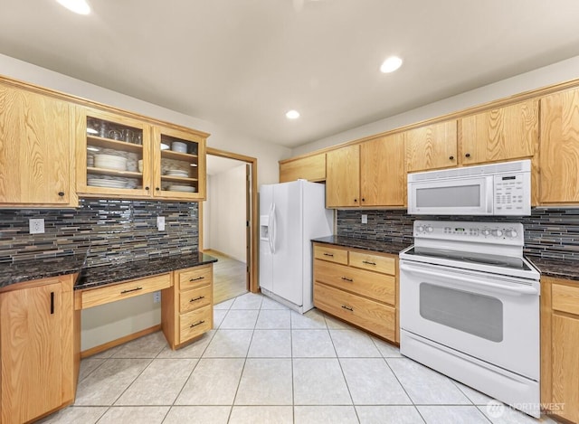 1307 Birchwood Dr, Everson, WA 98247 - kitchen with white appliances, backsplash, glass insert cabinets, light tile patterned flooring, and dark stone counters