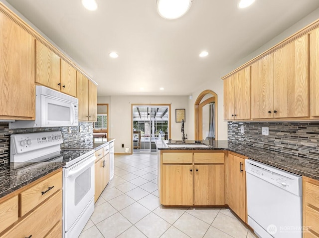 1307 Birchwood Dr, Everson, WA 98247 - kitchen featuring white appliances, a peninsula, light tile patterned floors, backsplash, and recessed lighting