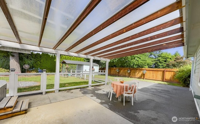 1307 Birchwood Dr, Everson, WA 98247 - fenced backyard featuring a storage unit, a patio, and outdoor dining area