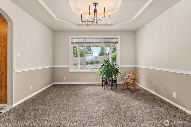 4618 51st Street Ct E, Tacoma, WA 98443 - sitting room featuring arched walkways, carpet floors, a raised ceiling, and a chandelier