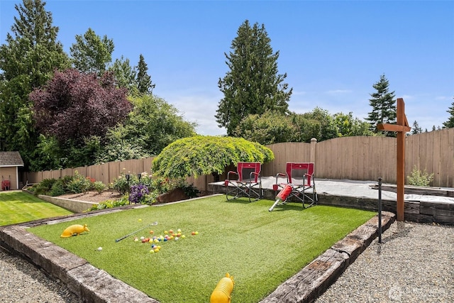 4618 51st Street Ct E, Tacoma, WA 98443 - fenced backyard with a patio area
