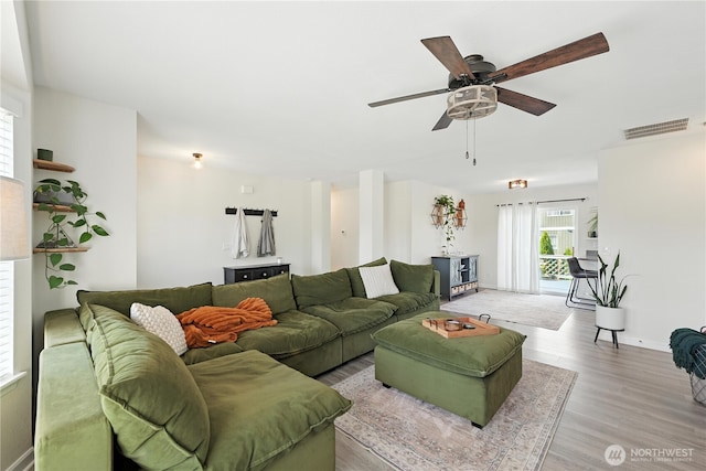 209 4th Ave N, Algona, WA 98001 - living area with light wood-style floors and ceiling fan