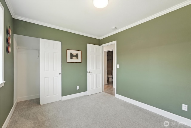 209 4th Ave N, Algona, WA 98001 - unfurnished bedroom featuring carpet floors, crown molding, and a closet