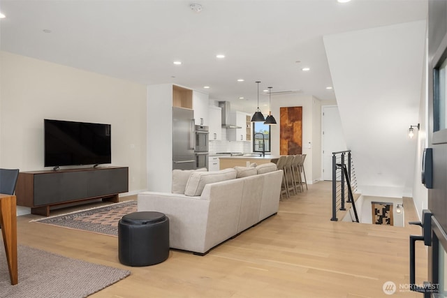 330 3rd Ave S Unit C, Kirkland, WA 98033 - living area featuring light wood-style flooring and recessed lighting