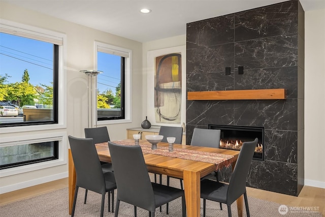 330 3rd Ave S Unit C, Kirkland, WA 98033 - dining area with a fireplace, recessed lighting, and wood finished floors