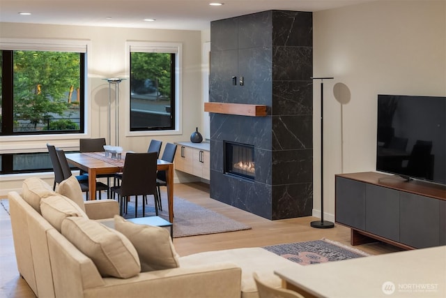 330 3rd Ave S Unit C, Kirkland, WA 98033 - living room featuring light wood-style flooring, recessed lighting, and a fireplace